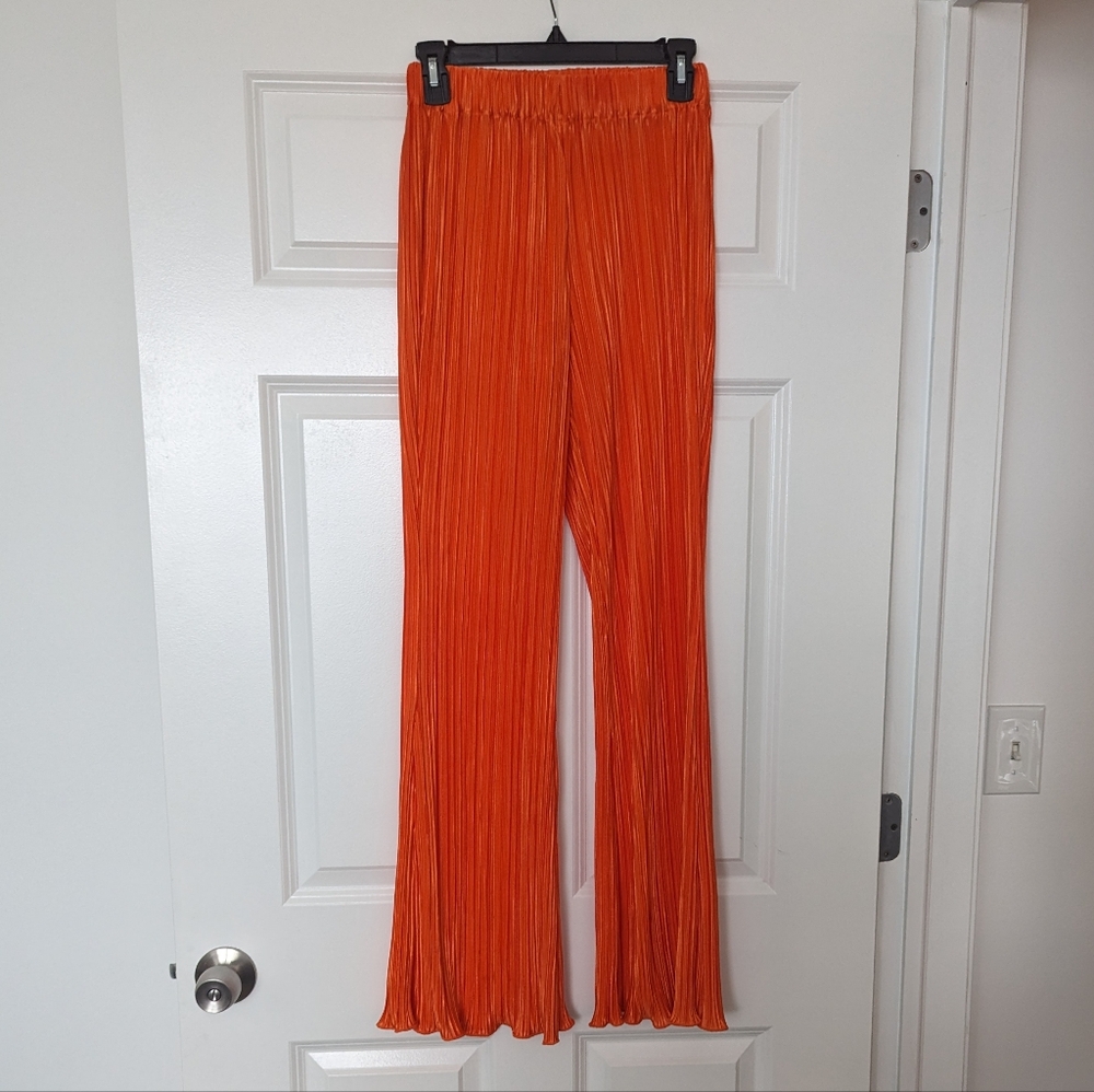 Orange plisse wide leg pants